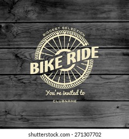 Bicycle badges logos and labels for any use, on wooden background texture