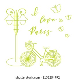 Bicycle with a basket of flowers, lantern, butterflies. The inscription I love Paris. Travel and leisure.