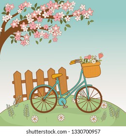 bicycle with floral basket and fence in the landscape