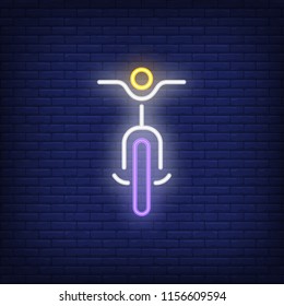 Bicycle front view neon sign. Bicycling, fitness and sport concept. Advertisement design. Night bright colorful billboard, light banner. Vector illustration in neon style.