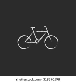 Bicycle hand drawn in chalk on a blackboard vector white icon isolated on a black background.