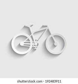 bicycle icon with shadow on a grey background