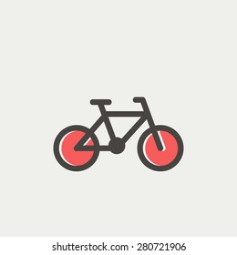 Bicycle icon thin line for web and mobile, modern minimalistic flat design. Vector icon with dark grey outline and offset colour on light grey background.