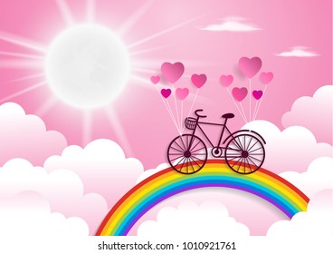 Bicycle riding on a rainbow with valentine's day.paper at style.