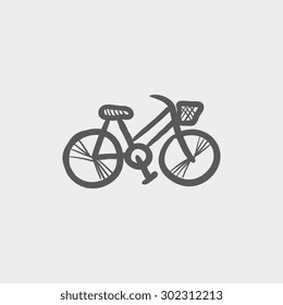 Bicycle sketch icon for web and mobile. Hand drawn vector dark grey icon on light grey background.