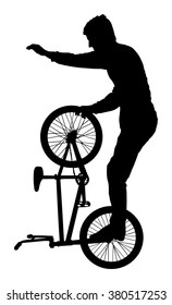 Bicycle stunts vector silhouette isolated on white background. Bike performer. exercising bmx acrobatic figure. Complicate trick, street artist riding bicycle on unusual way. Circus event scene.