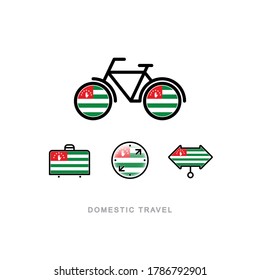 Bicycle, suitcase, compass, pointer with the national flag of ABKHAZIA. Domestic tourism icons set. Isolated objects. 