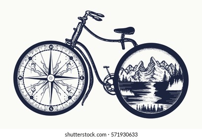 Bicycle tattoo art. Symbol of travel, tourism, adventure. Compass and mountains in bicycle wheels, t-shirt design