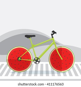 Bicycle with watermelon as wheel on the street