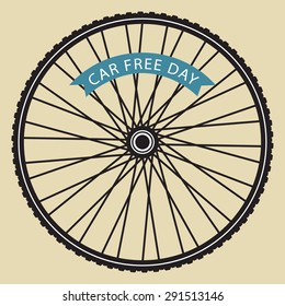 Bicycle wheel with car free day banner