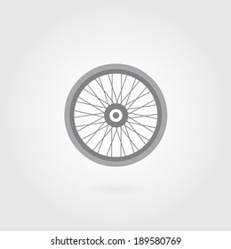 bicycle wheel symbol on gray background 