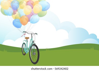 Bicycles and multicolored balloons on the meadow.