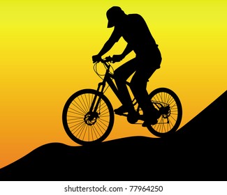 bicyclist on an orange background
