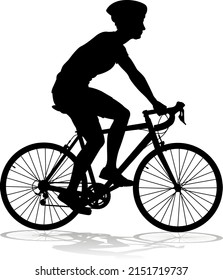 Bicyclist Riding Their Bike And Wearing A Safety Helmet In Silhouette