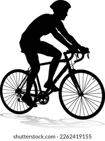 Bicyclist riding their bike and wearing a safety helmet in silhouette