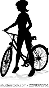 Bicyclist riding their bike and wearing a safety helmet in silhouette
