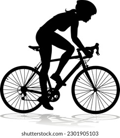 Bicyclist riding their bike and wearing a safety helmet in silhouette