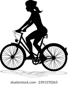 Bicyclist riding their bike and wearing a safety helmet in silhouette