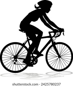 Bicyclist riding their bike and wearing a safety helmet in silhouette