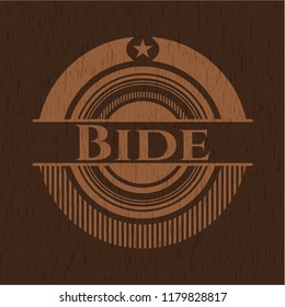 Bide wooden emblem