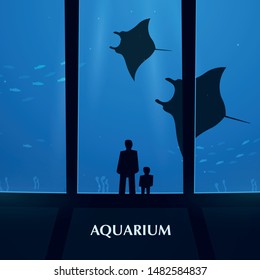 Big Aquarium or Oceanarium With crampfish. People with children watching the underwater world