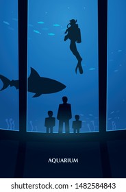 Big Aquarium or Oceanarium With shark. People watching the underwater world