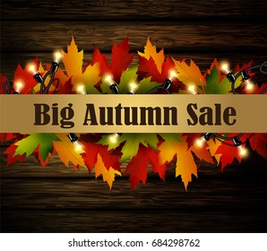 Big autumn special sale poster on isolated wodden background with patio lights