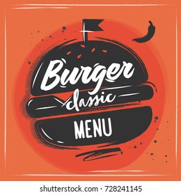 A big black burger with letting on it. Red background