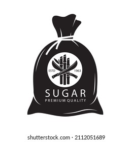 big black knotted sack with cane sugar isolated on white background