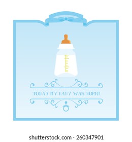 Big bottle full of milk to announce the birth of a baby boy