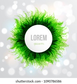 Big bright green grunge circle with place for your text on white glowing background.