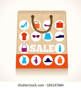 Big carry paper sale shopping bag concept with clothes and accessories icons vector illustration