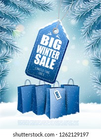 Big Christmas sale on winter background with branches of tree and shopping bags. Vector