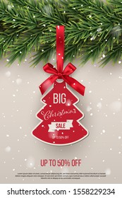 Big Christmas sale vector tag template. Xmas discount advertising campaign. New year tree toy with ribbon realistic illustration. Special offer concept. Shopping low prices label design element