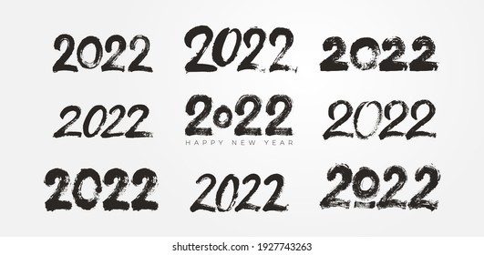 Big Collection of 2022 Happy New Year typography logo brush strokes text design. 2022 number design template. Set of 2022 happy new year symbols. Freehand drawing. Vector illustration with black.