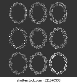 Big collection of white frames with leaves and flowers. Vector oval wreaths isolated on black background.