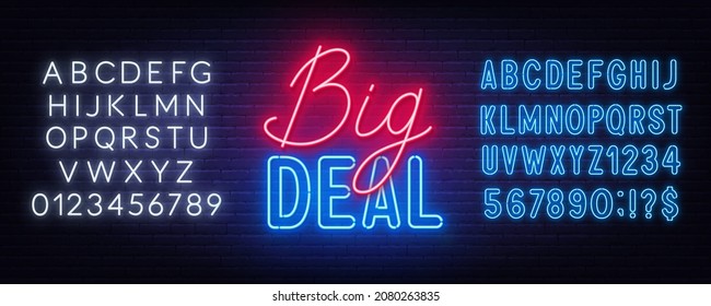 Big Deal neon sign on brick wall background