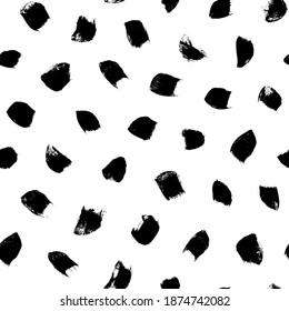 Big dots vector seamless pattern. Polka dot motif wallpaper. Abstract pattern of bold black shabby dots or spots on white background. Hand drawn black ornament for wallpaper, textile and fabric design