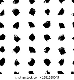 Big dots vector seamless pattern. Polka dot wallpaper. Abstract pattern of bold black shabby dots or spots in vertical lines. Hand drawn black ornament for wallpaper, textile and fabric design
