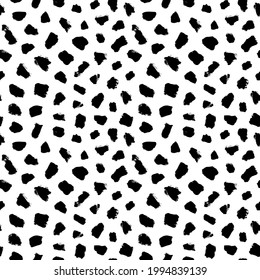 Big dots vector seamless pattern. Polka dot motif wallpaper. Abstract pattern of bold black shabby dots or spots on white background. Hand drawn black ornament for wallpaper, textile and fabric design