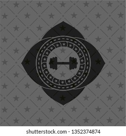 big dumbbell icon inside black badge
