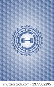 big dumbbell icon inside blue emblem or badge with abstract geometric polygonal pattern background.
