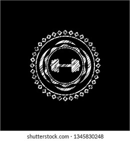big dumbbell icon inside chalkboard emblem written on a blackboard