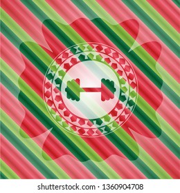 big dumbbell icon inside christmas emblem.