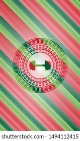big dumbbell icon inside christmas badge.