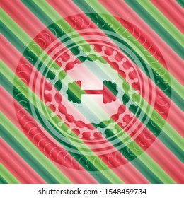 big dumbbell icon inside christmas colors style badge.