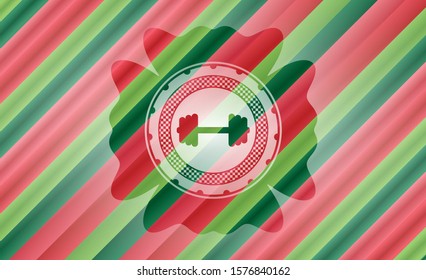 big dumbbell icon inside christmas colors style emblem.