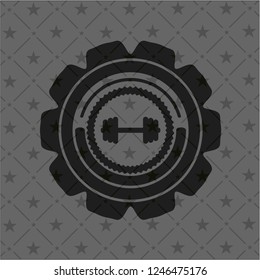 big dumbbell icon inside dark badge