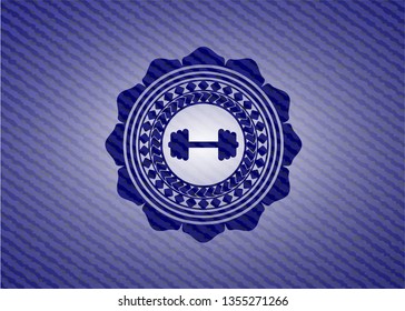 big dumbbell icon inside emblem with denim texture