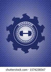 big dumbbell icon inside emblem with jean high quality background